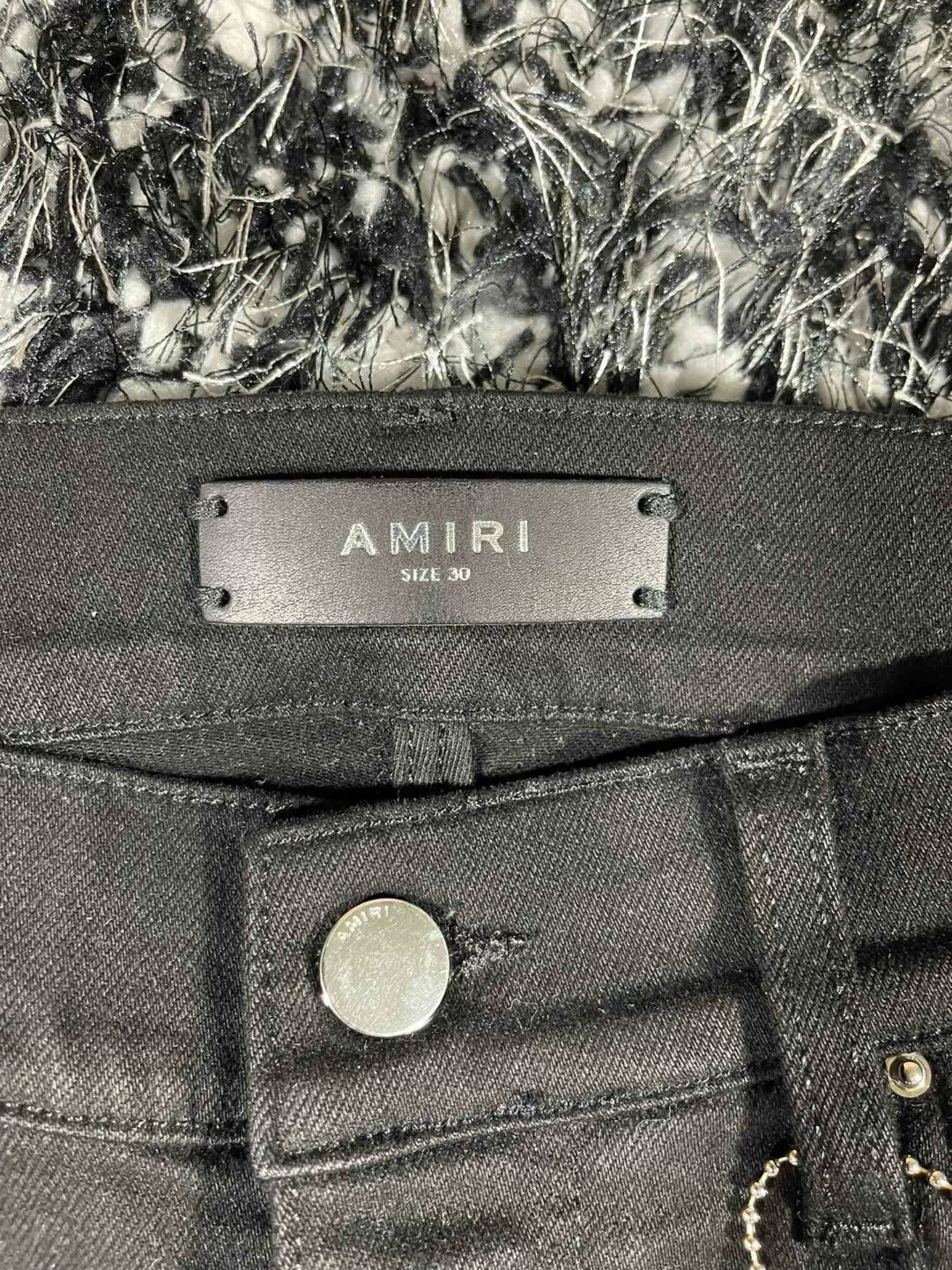 amiri watercolor half track jean