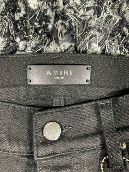 amiri watercolor half track jean
