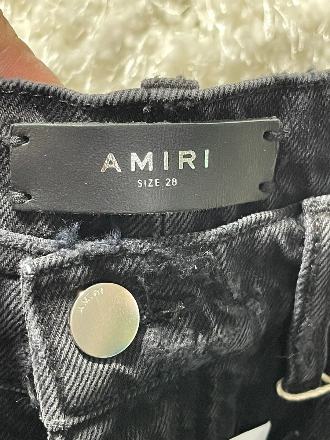 amiri destroyed slouch jeans in black
