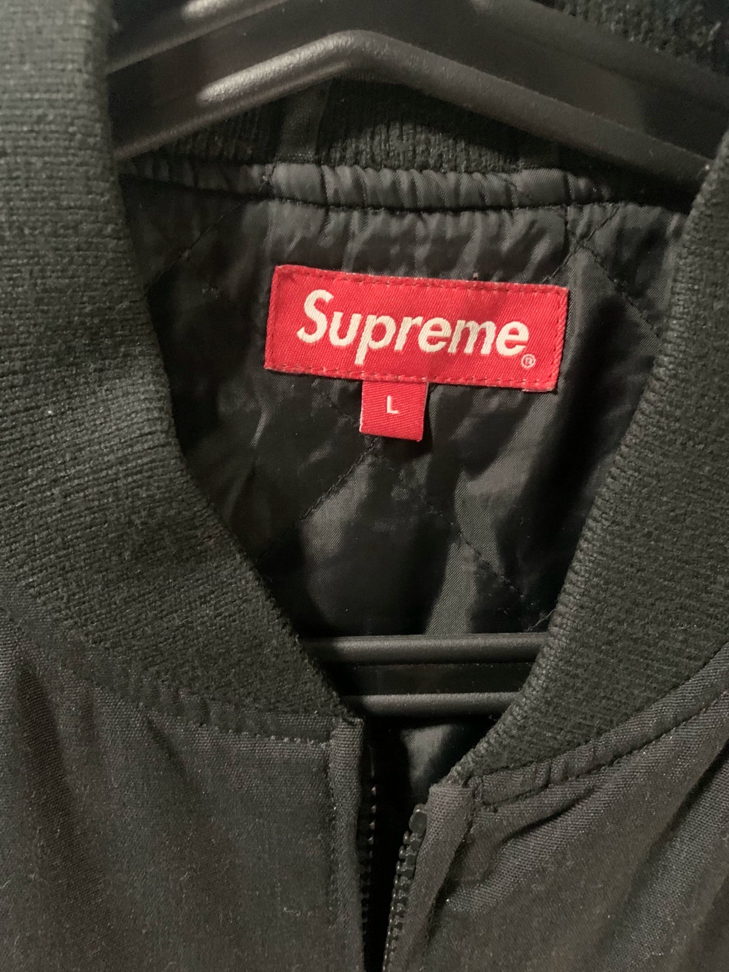 supreme black jacket with colorful embroidery