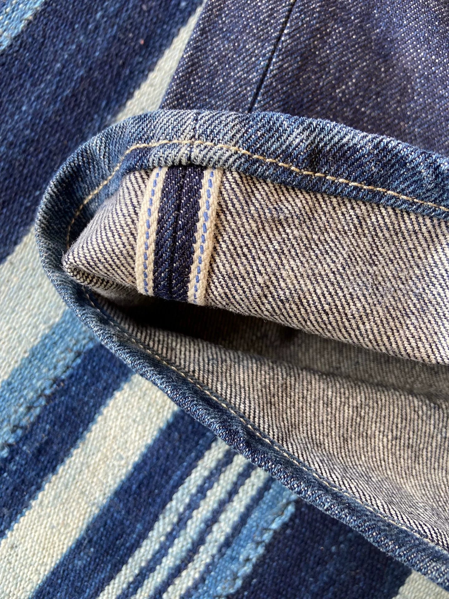 washed vintage-style raw denim jeans