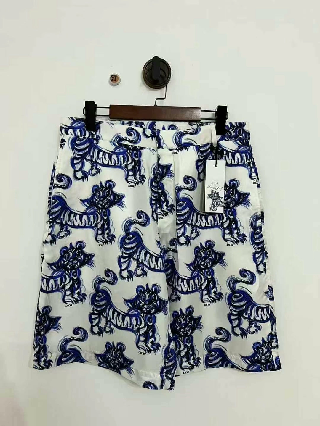 dior tiger logo shorts in white and blue