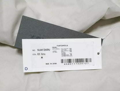 nanamica reversible down cardigan in ecru