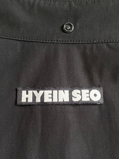 black pocket shirt with hidden buttons