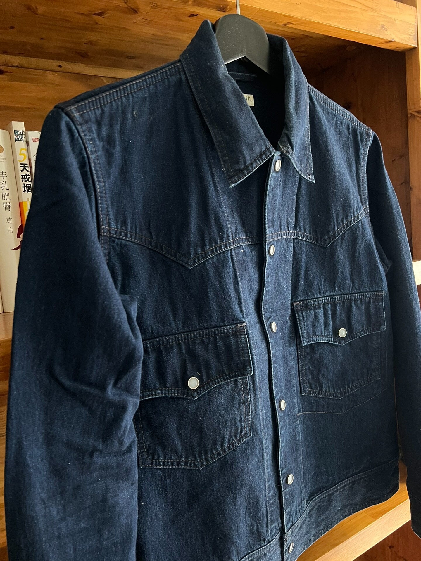 blue dyed work jacket with gem buttons