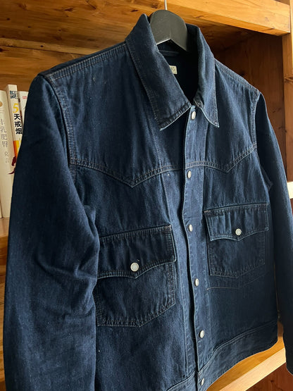 blue dyed work jacket with gem buttons