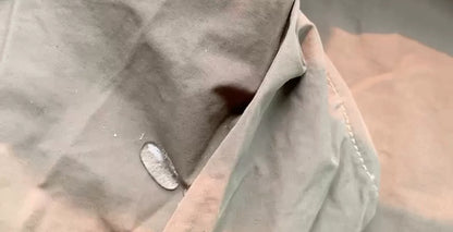 tactical raincoat for outdoor adventure in green