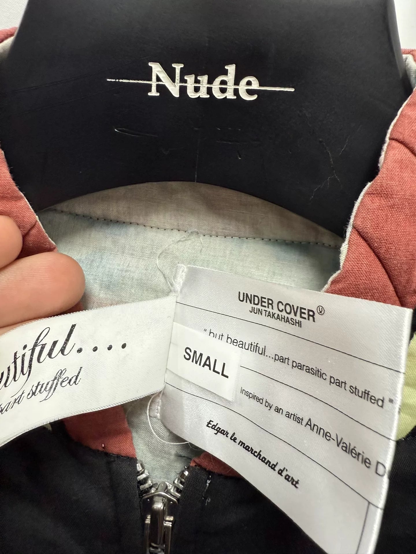 undercover bomber jacket with red accents