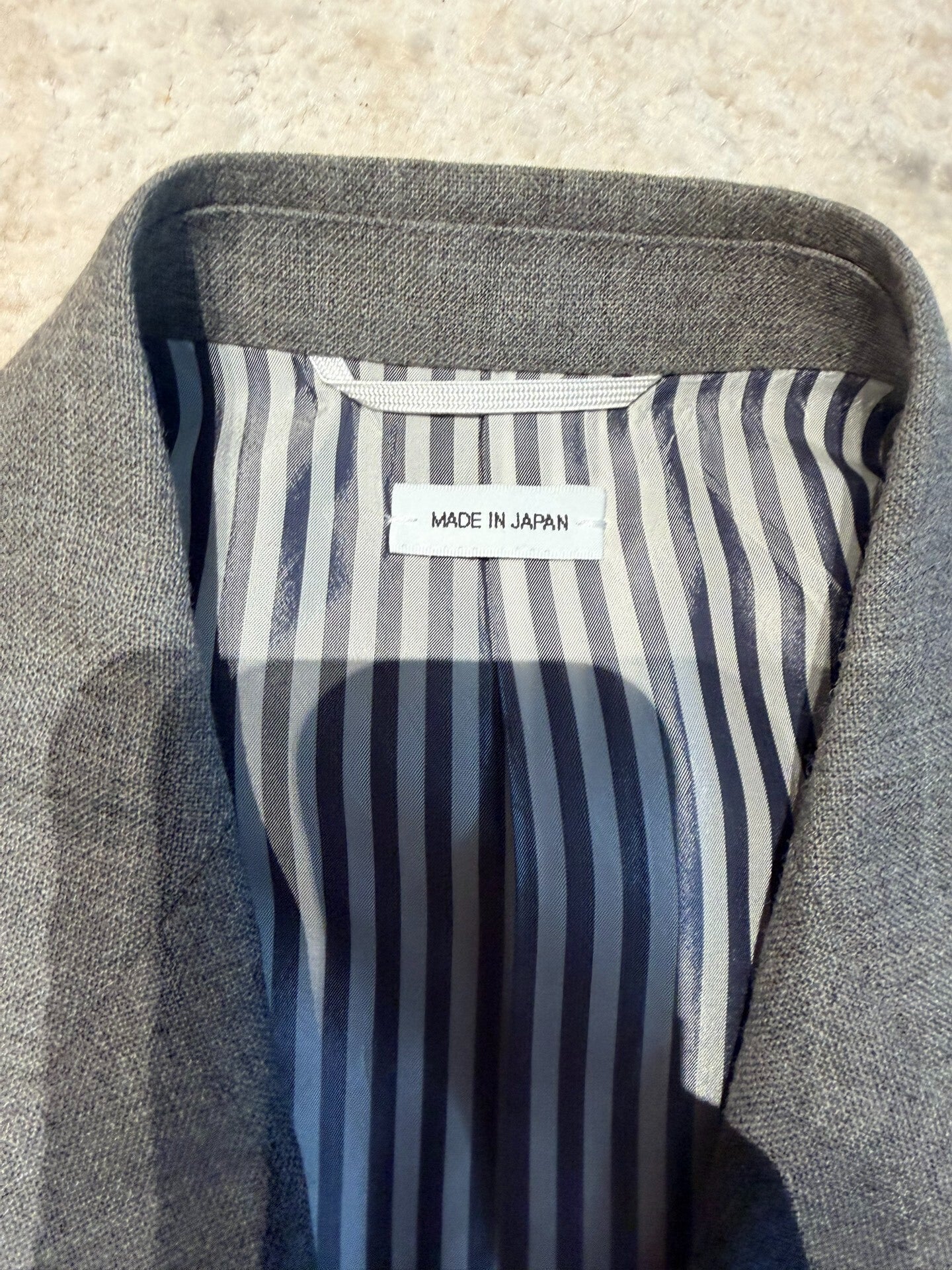 thom browne classic gray blazer with frayed edges