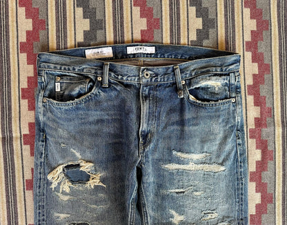 fdmtl slim fit denim distressed jeans