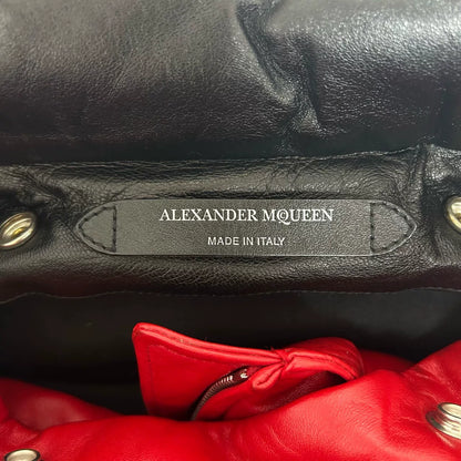 black leather down jacket with red accents