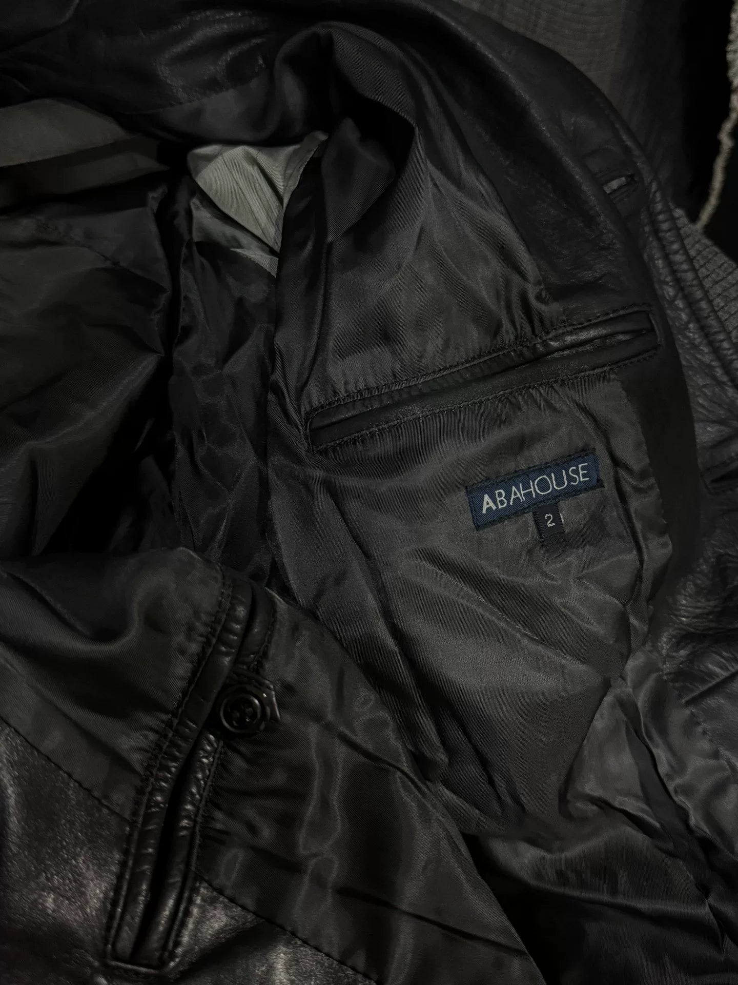 black leather suit coat with vampire style