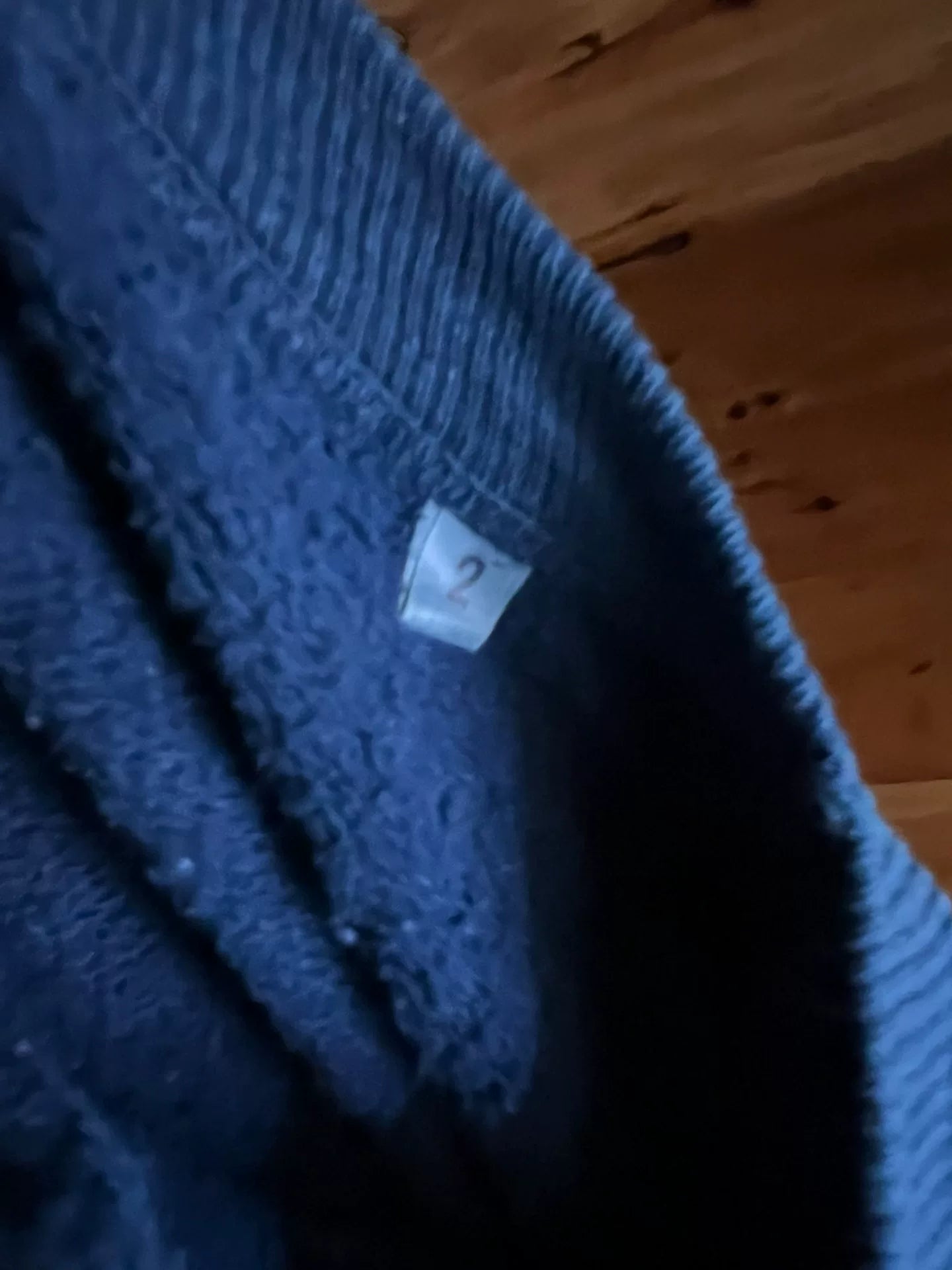 blue denim wash sweatshirt with text