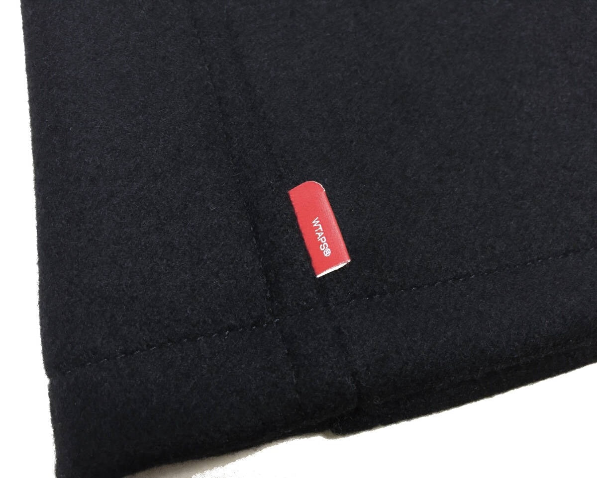 black wool watch coat with single button