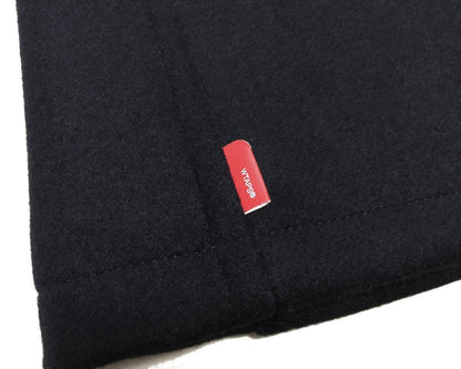 black wool watch coat with single button
