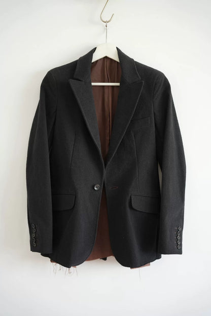 black tailored suit jacket by Sulvam
