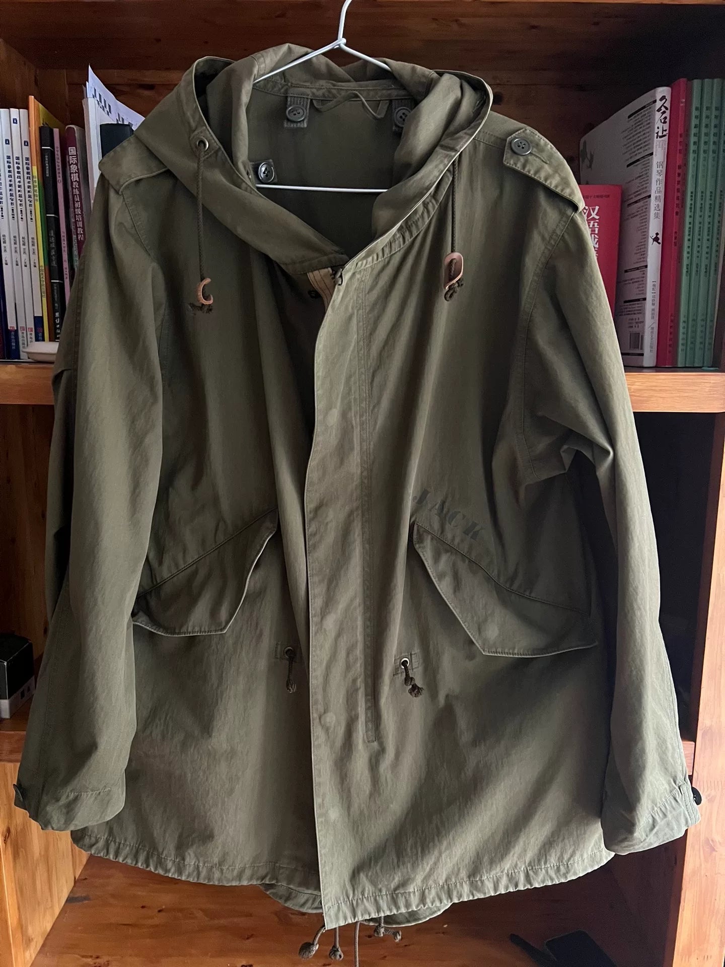 military-style hooded trench coat in olive green