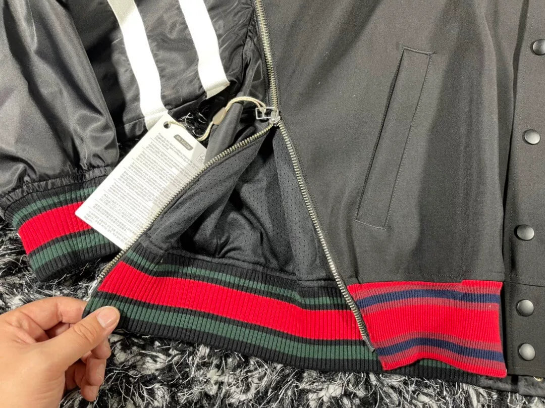 facetam black jacket with red accents