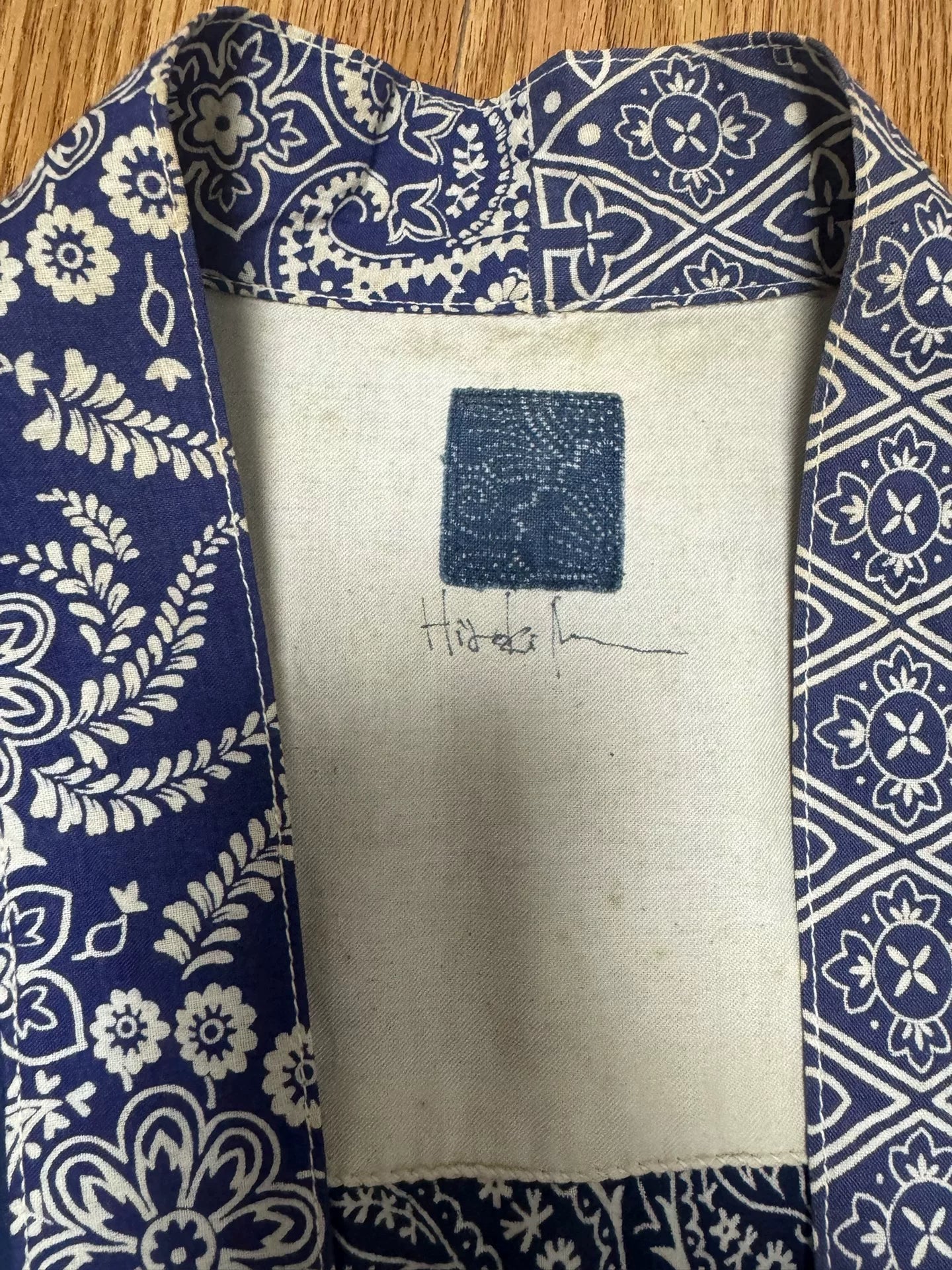 blue paisley patterned lhamo shirt