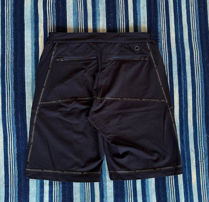 white mountaineering functional shorts with quick-dry fabric