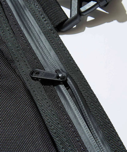 black utility vest bag from f/ce