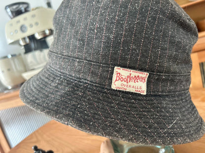 unique gray bucket hat with logo patch