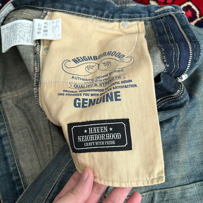 distressed blue jeans with unique detailing