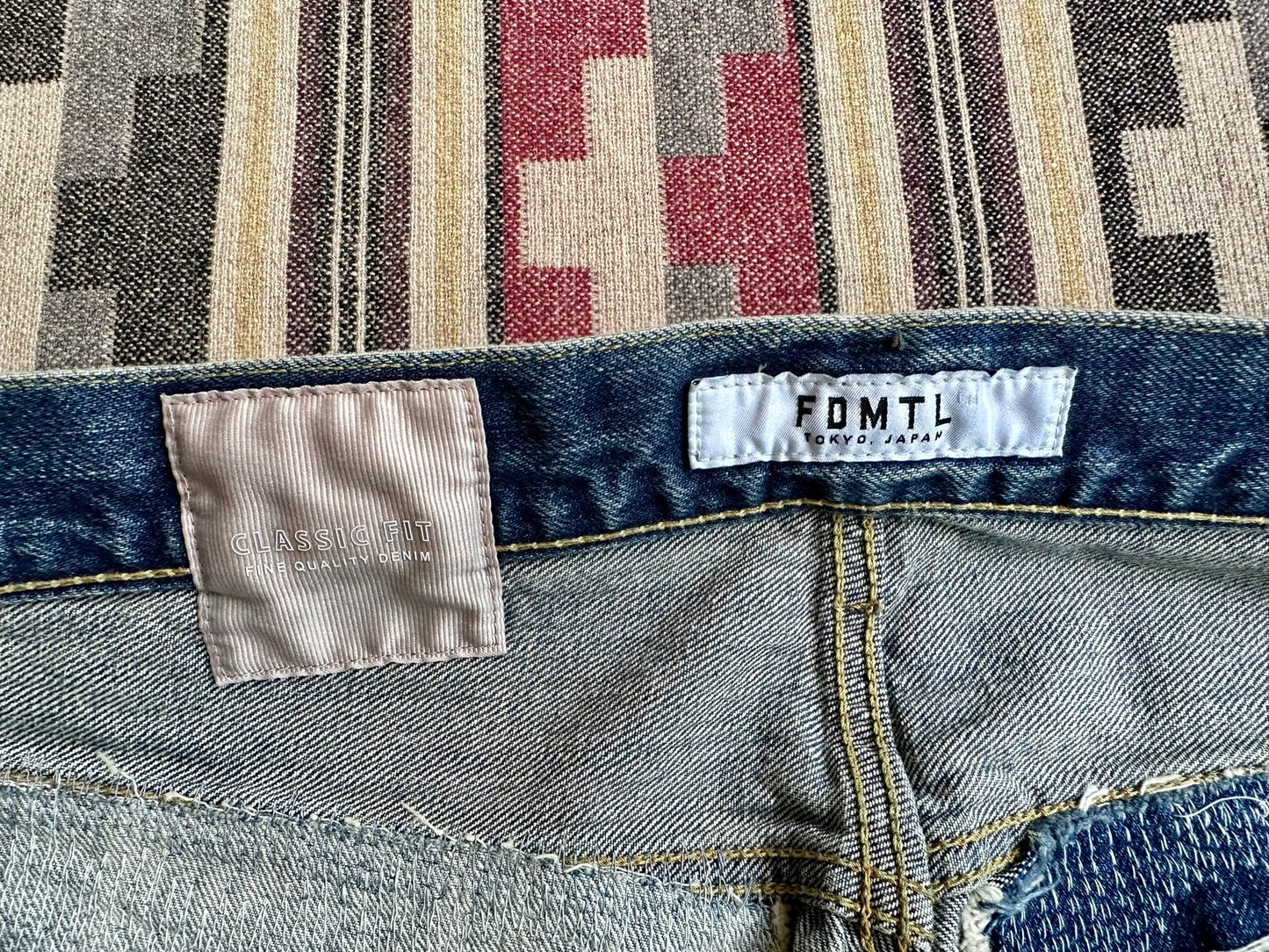 fdmtl classic fit red line distressed jeans