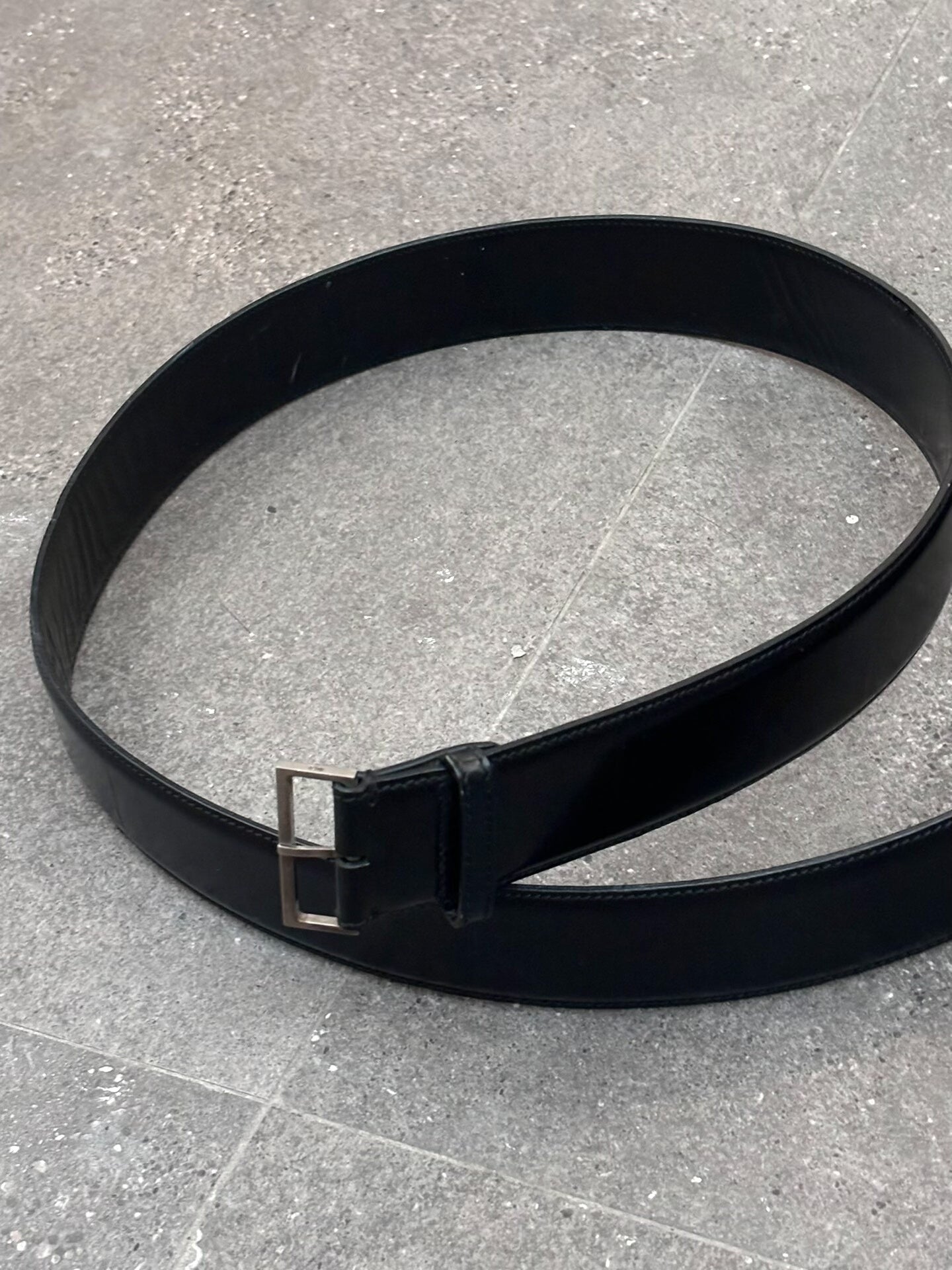minimalist black leather belt by Dior