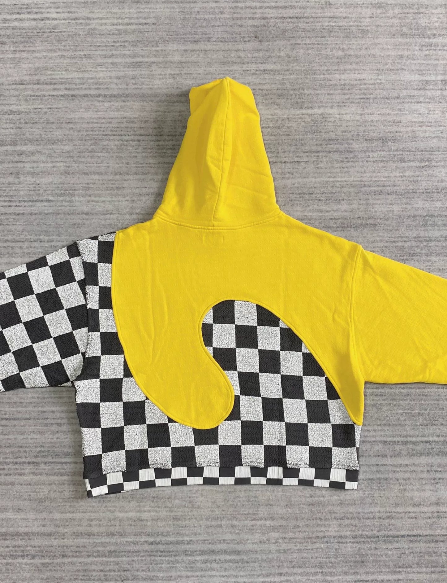 black and yellow checkerboard hooded sweatshirt