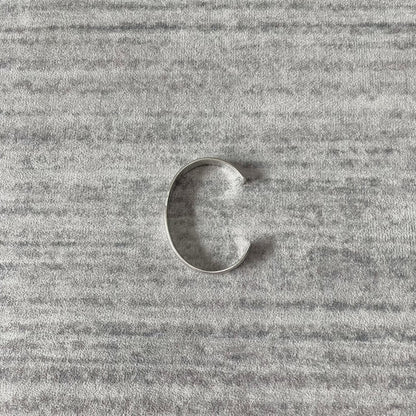 silver adjustable bracelet with teeth design