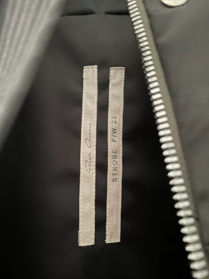 oversized black puffer jacket with waist tie