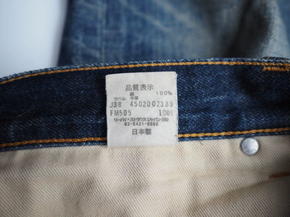 fenom gold badge distressed denim pants