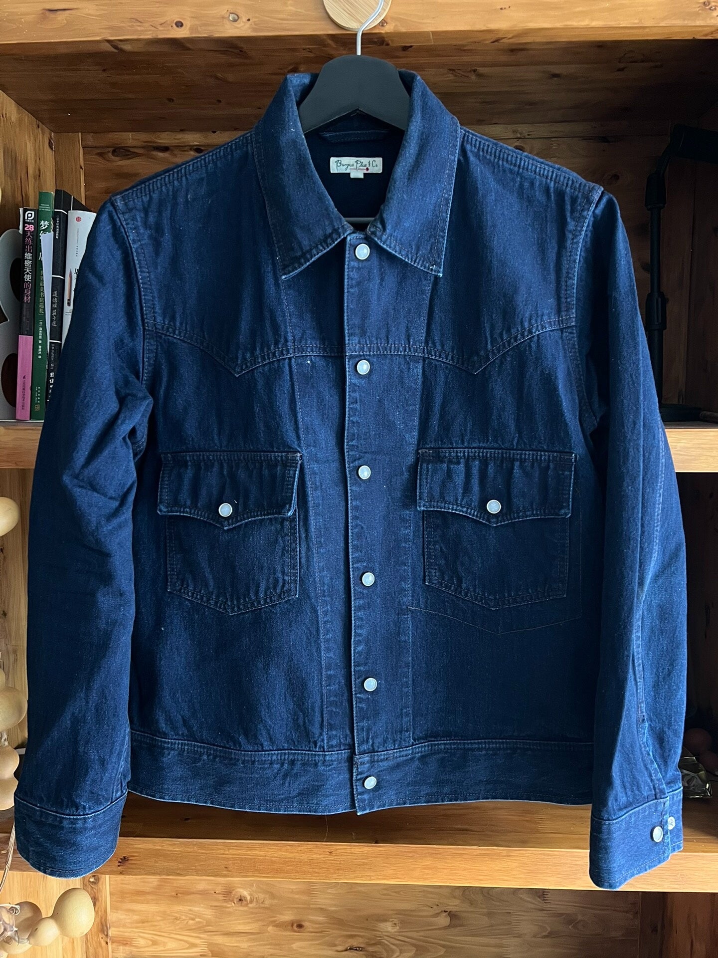 blue dyed work jacket with gem buttons