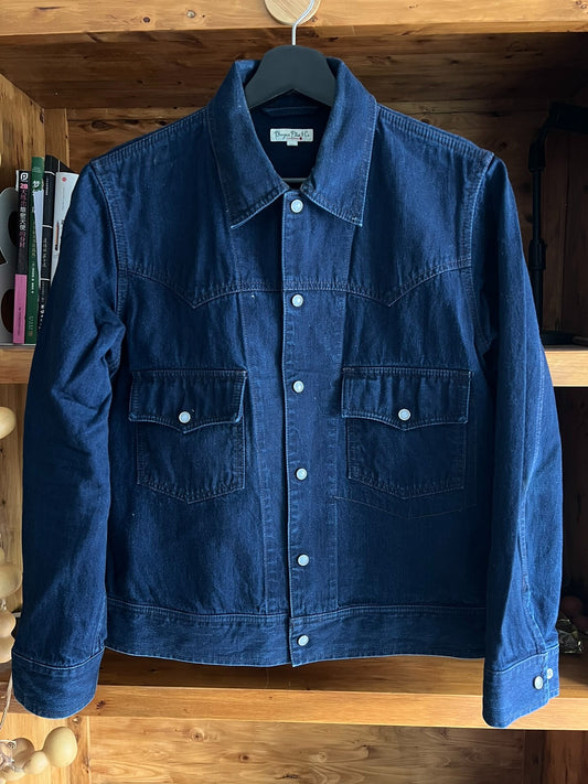 blue dyed work jacket with gem buttons