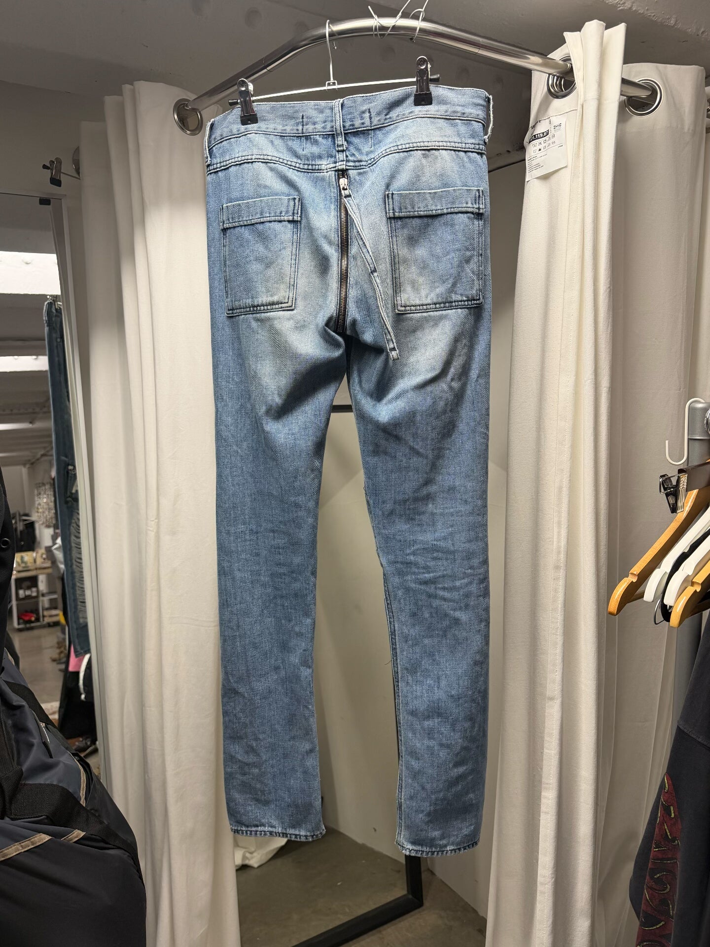 blue shredder zip jeans with distressed details