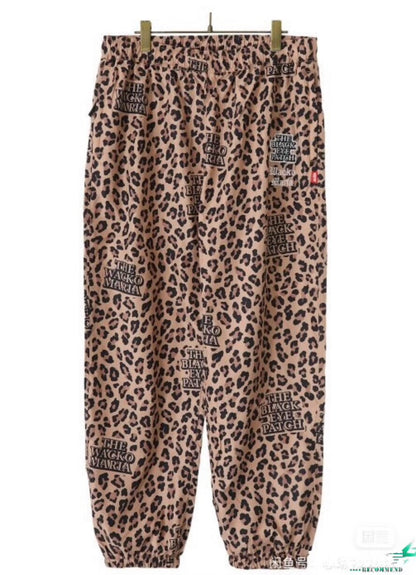 leopard print nylon track pants
