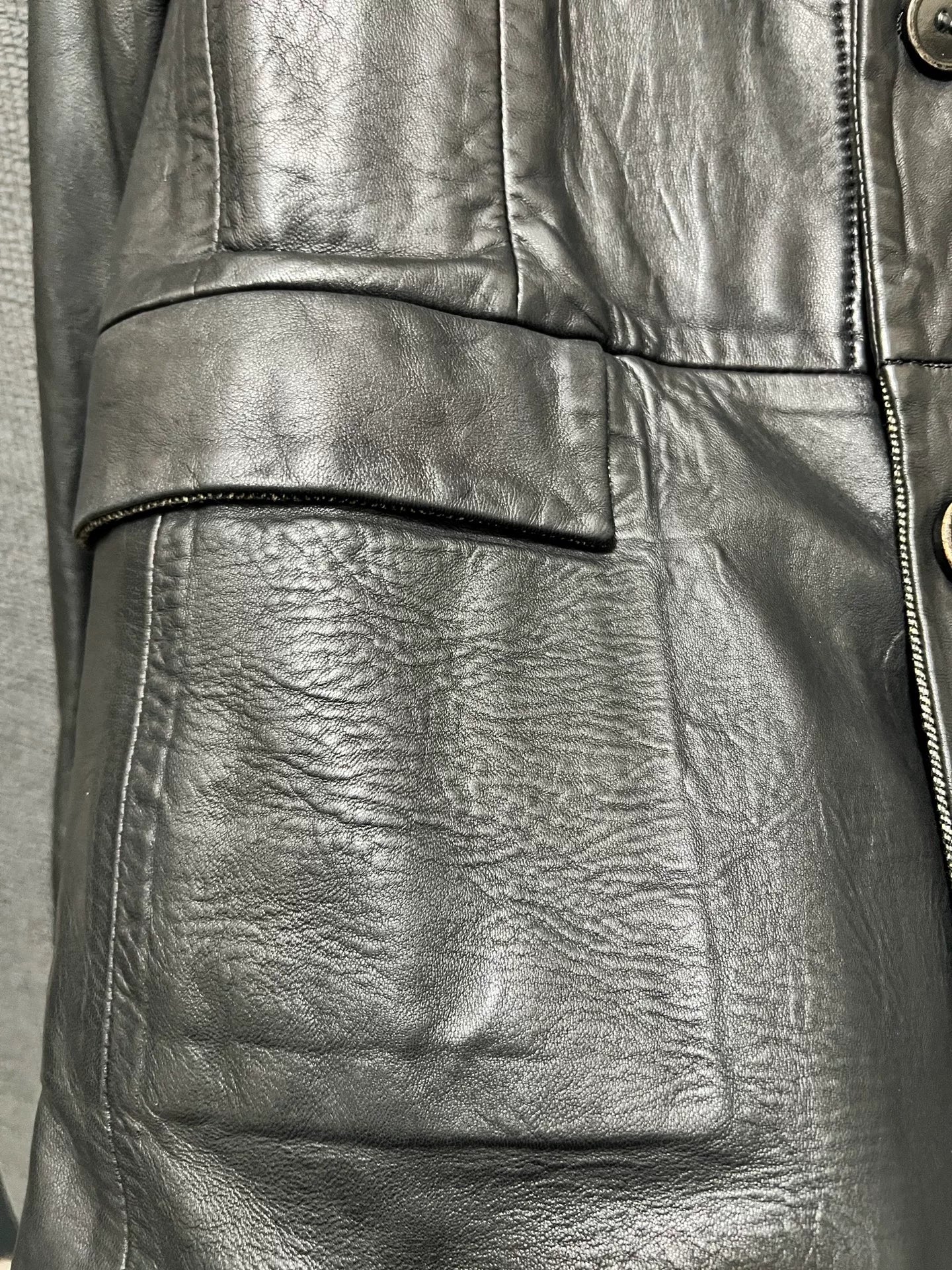 dark leather overcoat by isaac sellam experience