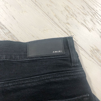 AMIRI Black Distressed Jeans with Floral Lining
