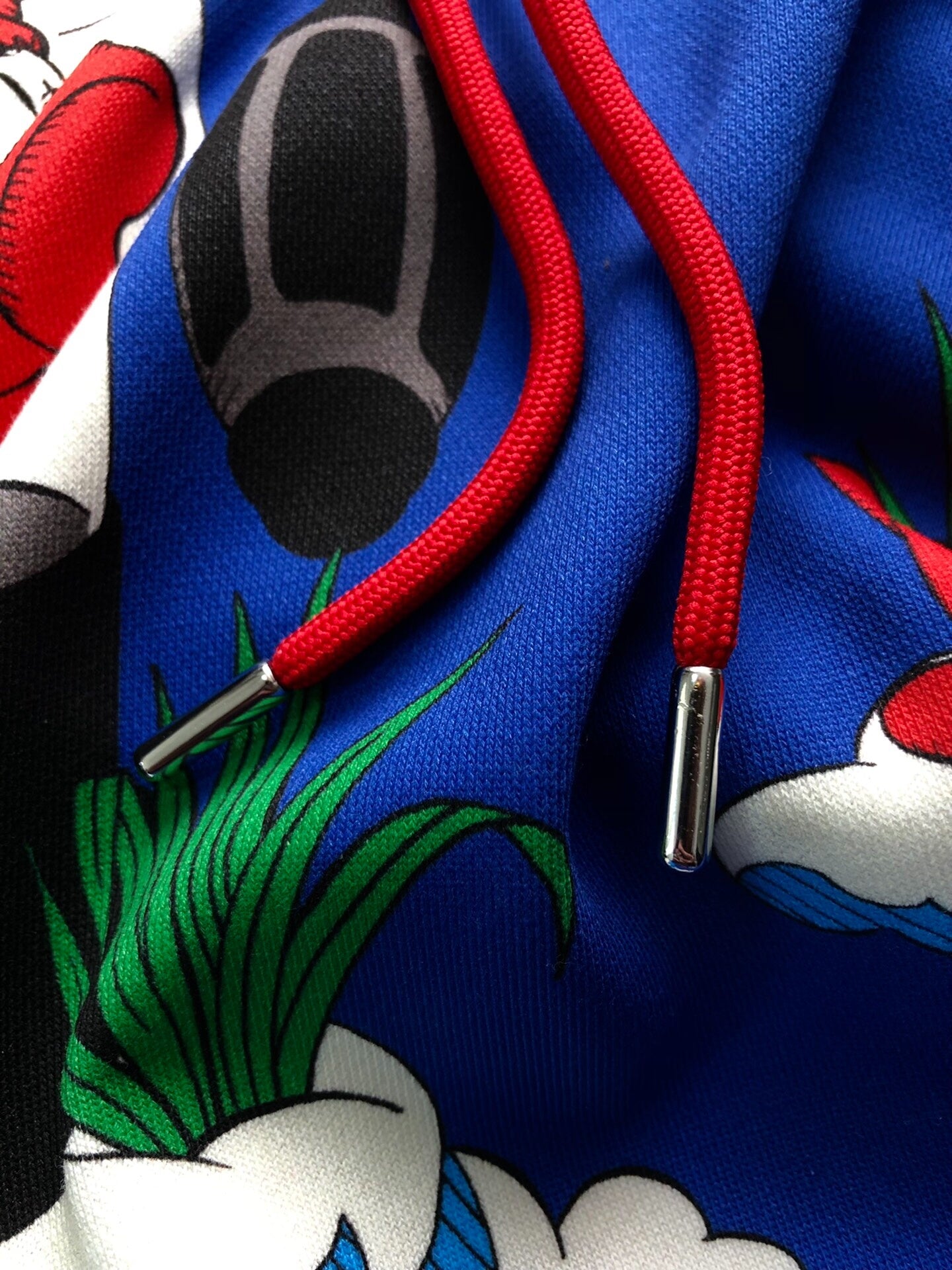 colorful hooded sweatshirt by Walter Van Beirendonck