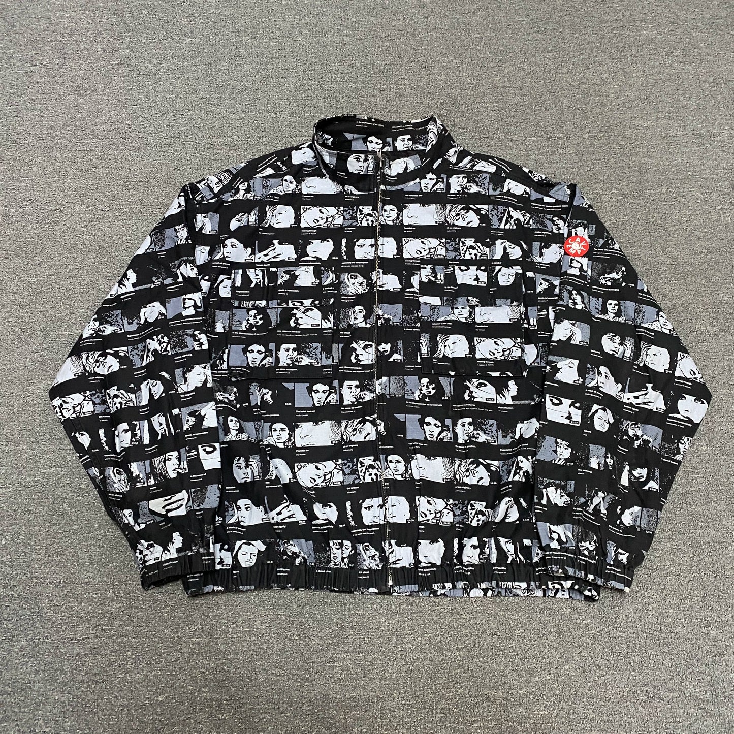 CAVEMPT All-Over Face Print Jacket