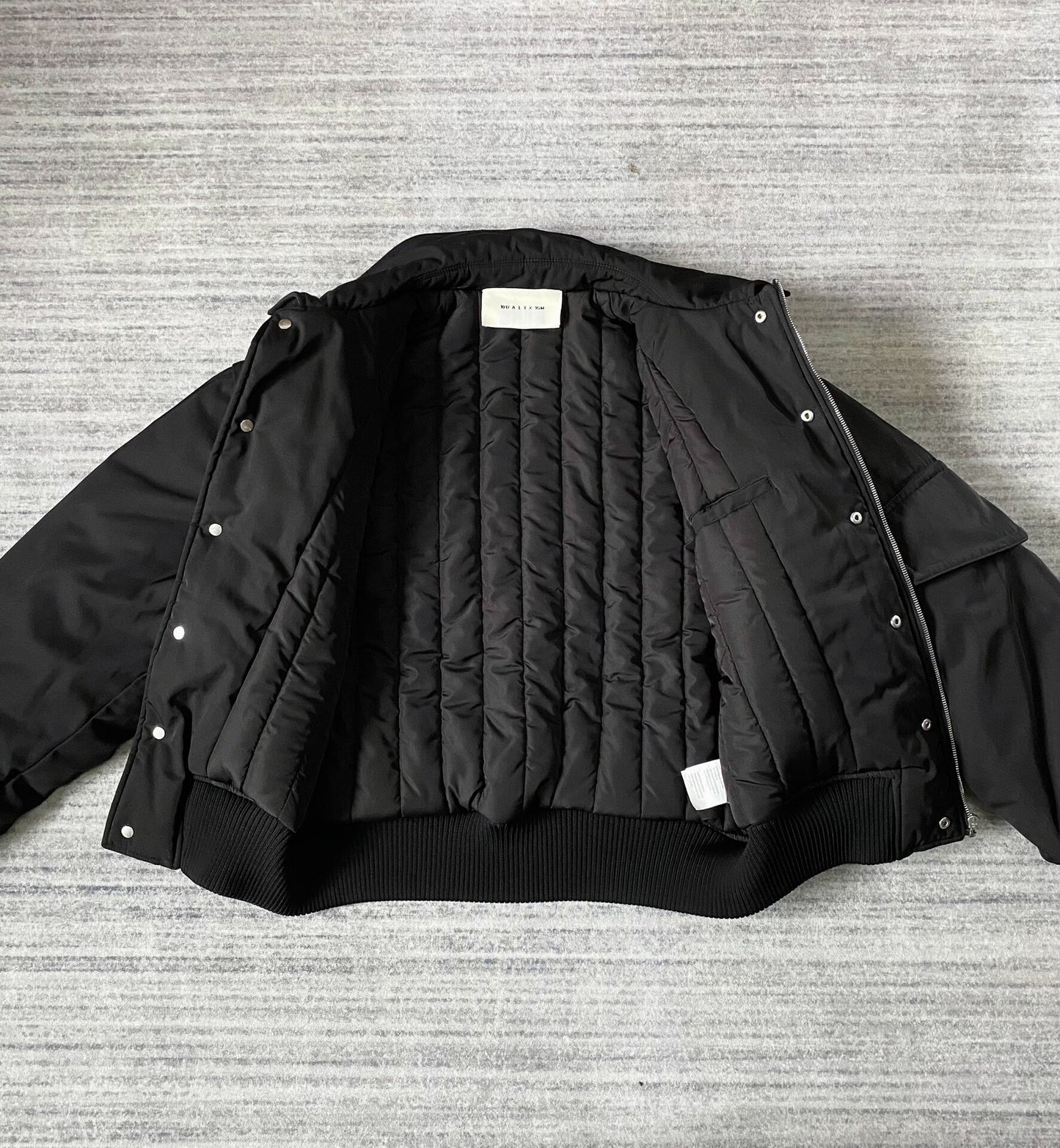 black bomber jacket with hidden pockets