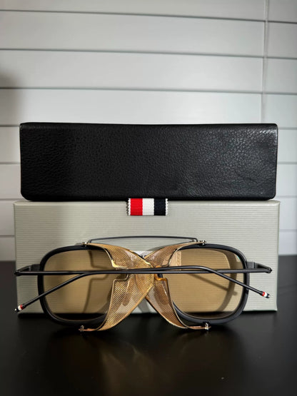thom browne tb-808 sunglasses with gold accents