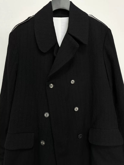 black double-breasted wool long coat