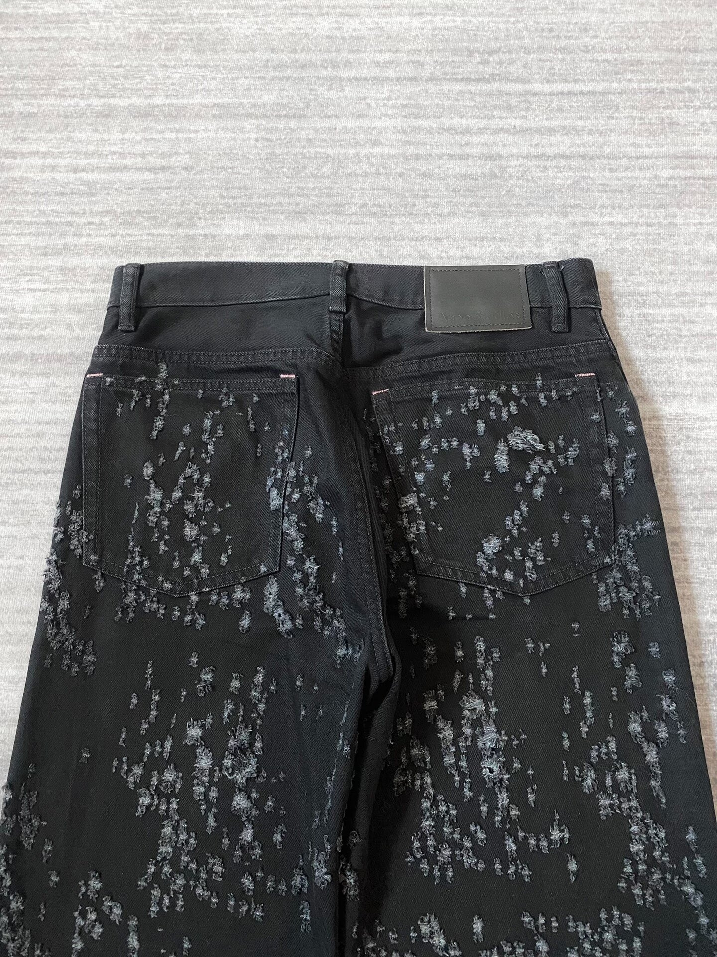 Acne Studios Distressed Black Denim Flared Pants