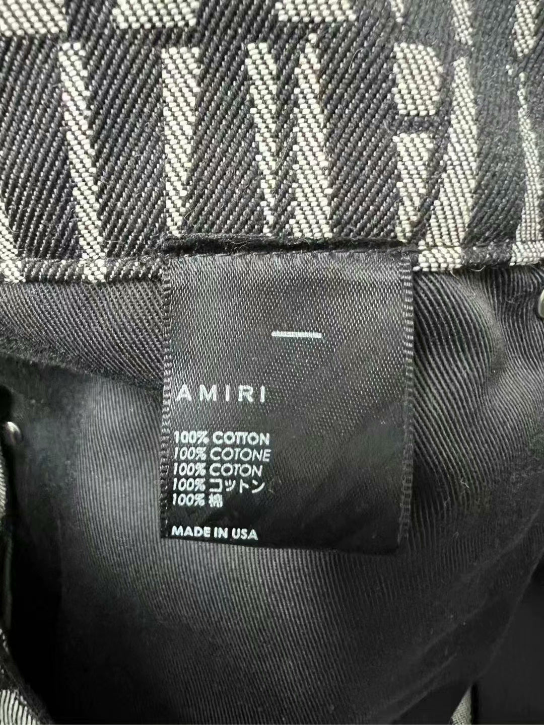 amiri logo detail side button jeans