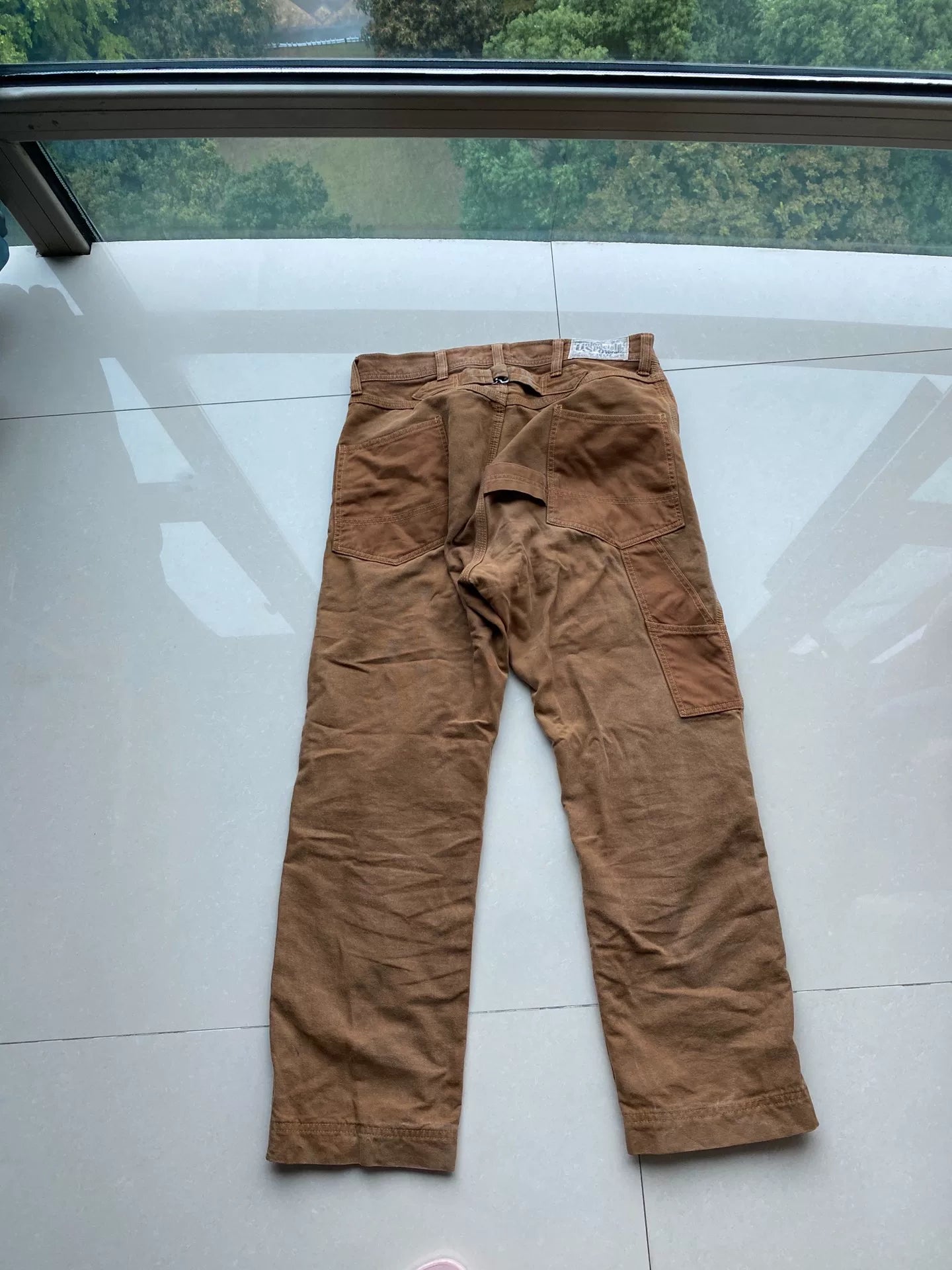 brown patched work pants derrickman