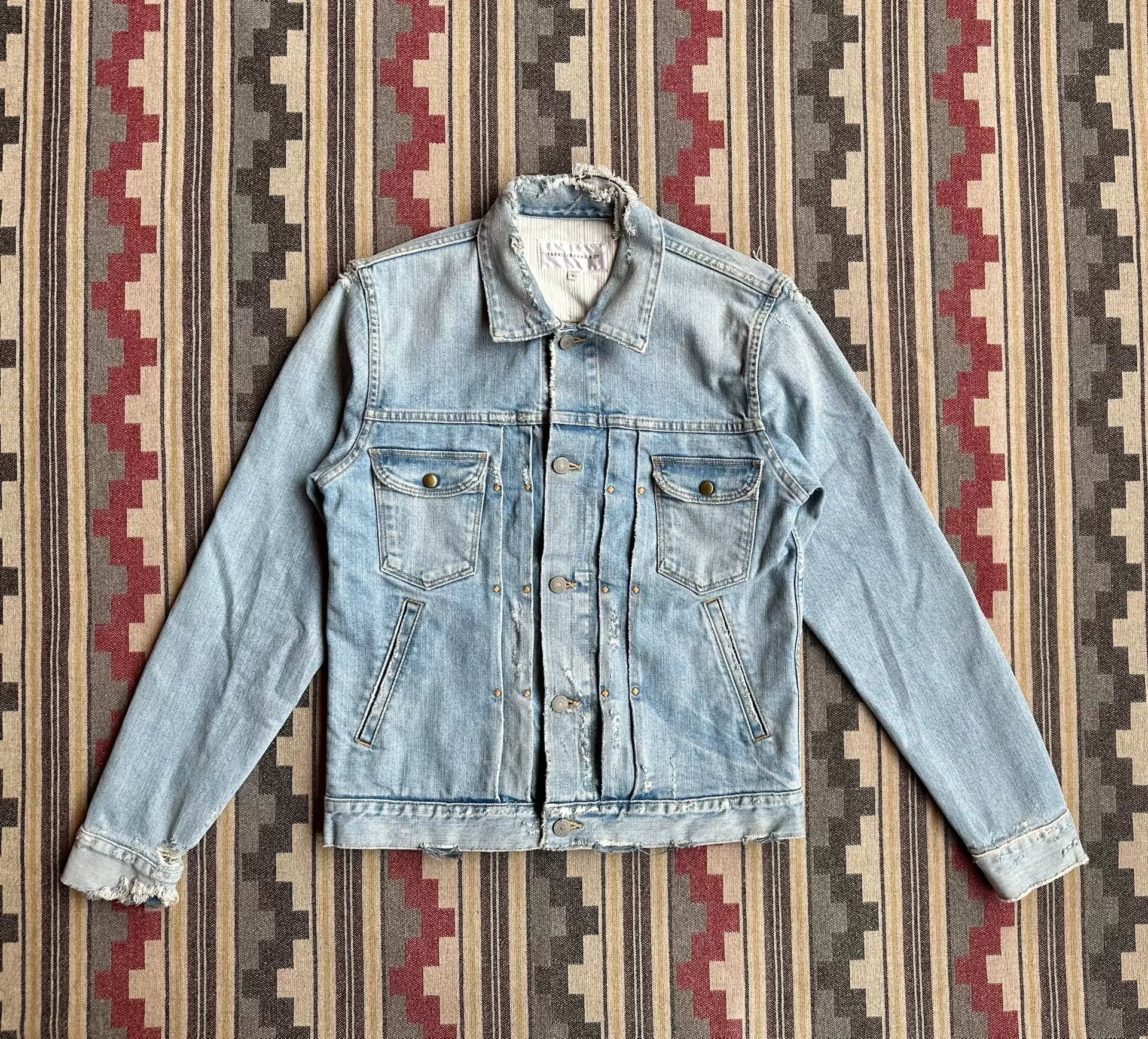 denim jacket with distressed details