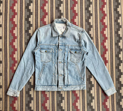 denim jacket with distressed details