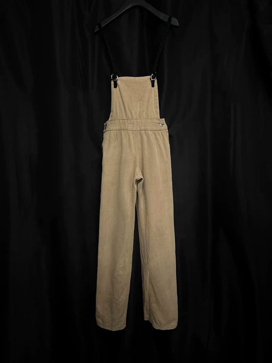 beige velvet overalls with silver buckles